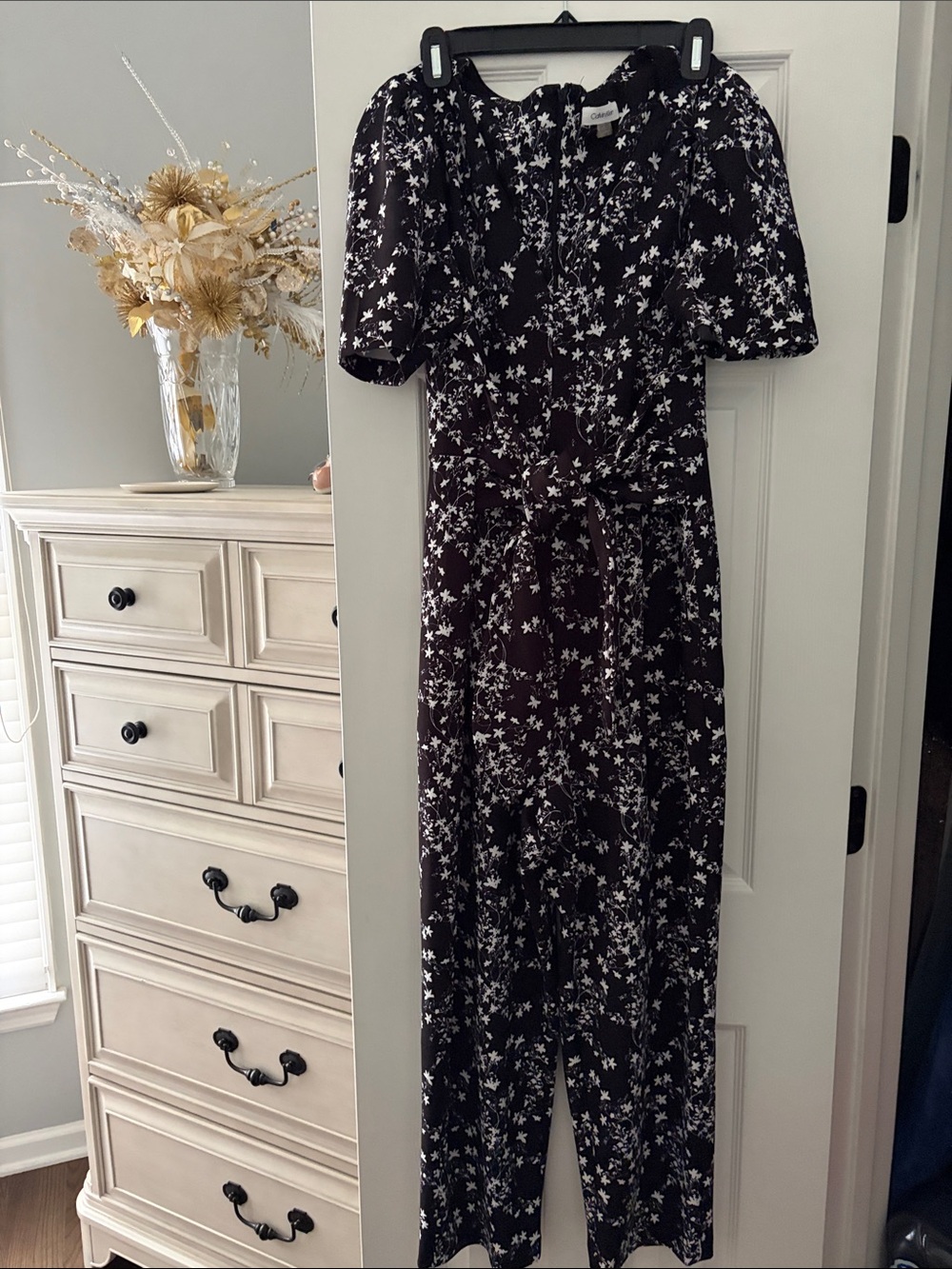 Calvin Klein Black Jumpsuit with White Floral Print and Tie Waist